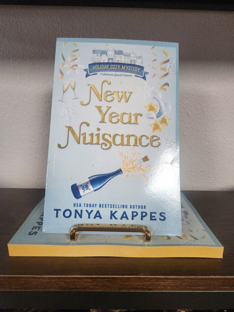 Holiday Cozy Mystery (4)New Year Nuisance by Tonya Kappes Sprayed Edge Paperback